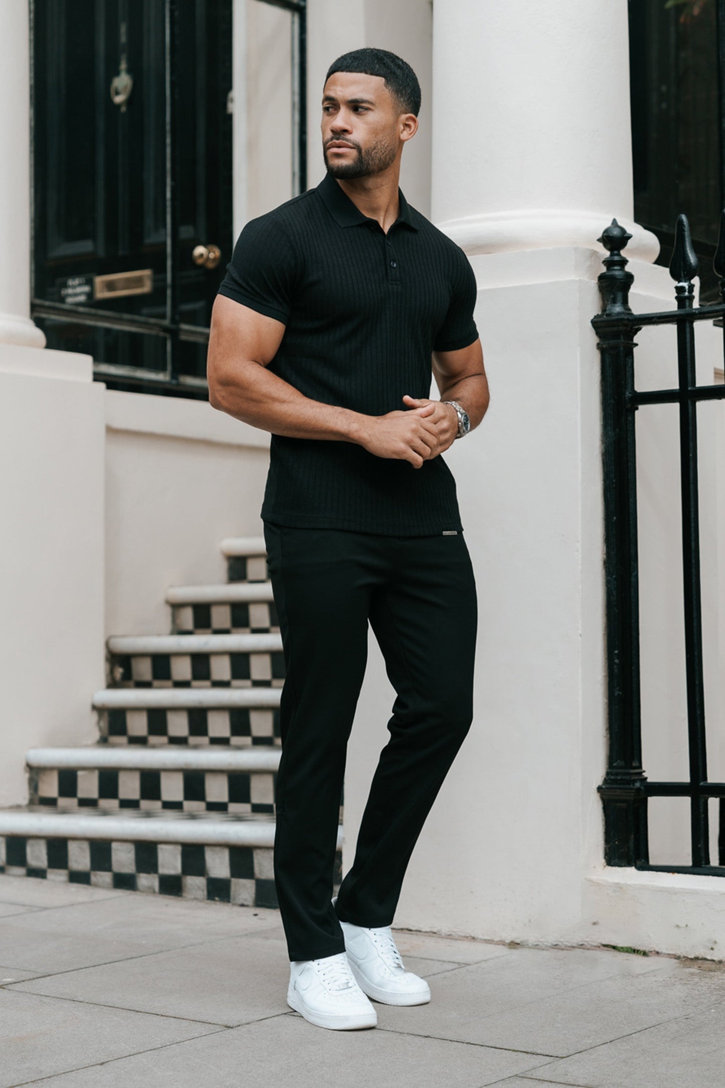 THE RIBBED SHORTSLEEVE POLO - BLACK